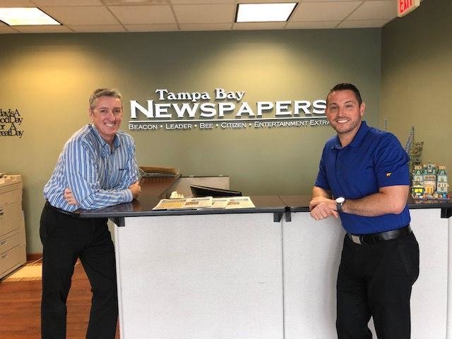 Dan Autrey, left, who recently retired as publisher for Tampa Bay Newspapers, is shown with his successor, Jay Rey.